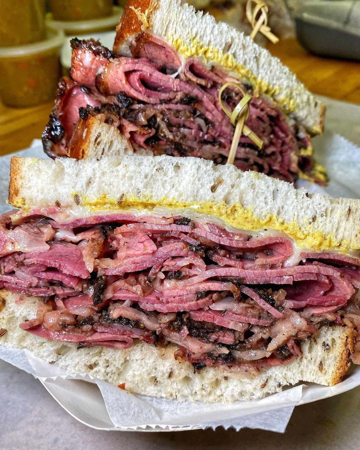 A stacked pastrami sandwich