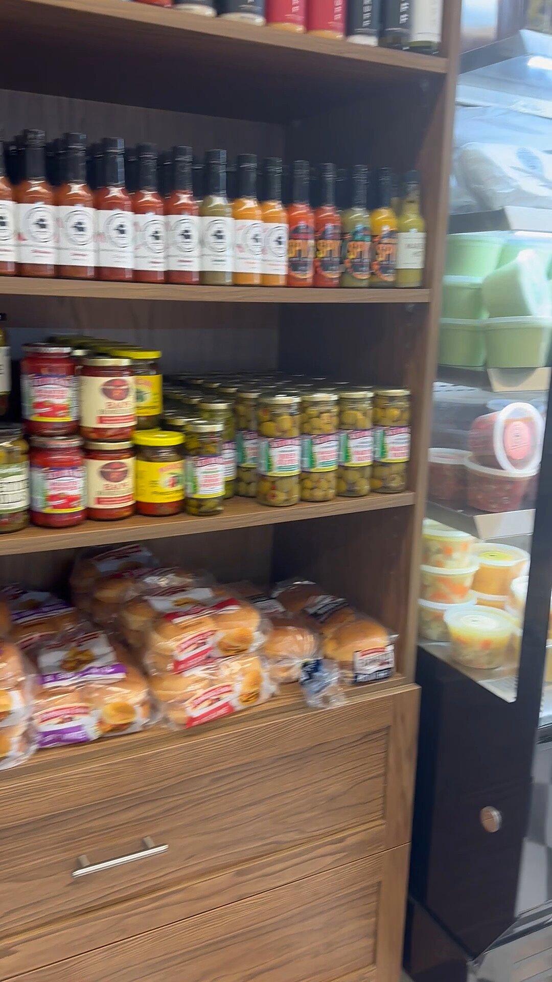 Hot sauces and jarred goods on the Market shelf